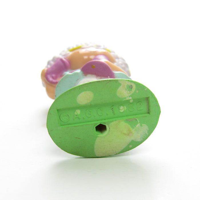 Angel Cake chatting on the phone miniature figurine with mottled plastic on bottom