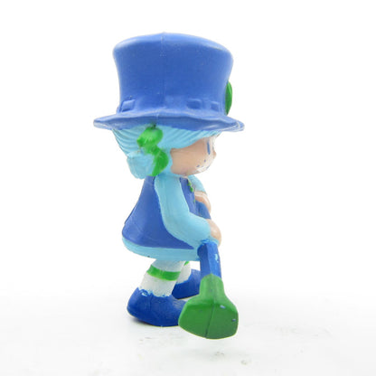 Blueberry Muffin with her Hoe vintage Strawberry Shortcake miniature figurine
