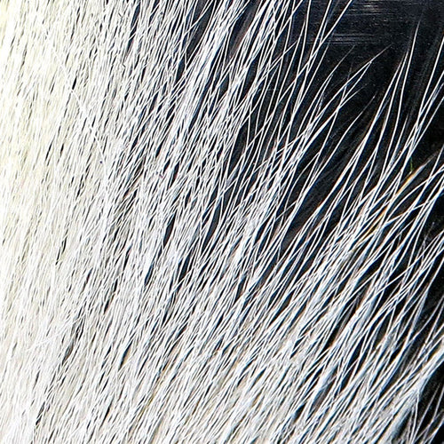 Large Northern Bucktail fibers in natural and black shades for premium fly tying at Freestone Fly Shop fly fishing supplies