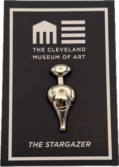 Metallic 'The Stargazer' sculpture Lapel Pin on a card with 'The Cleveland Museum of Art' branding.